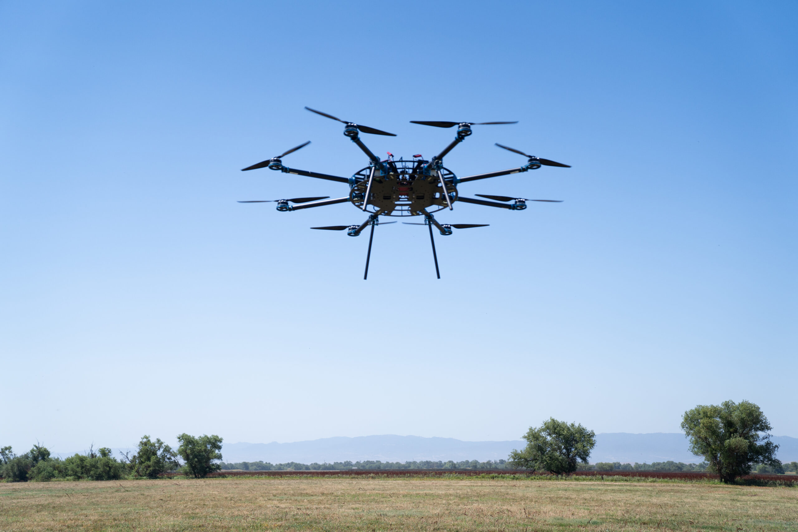 Aero Systems West HLM Octocopter flying at our test range in San Martin, CA.