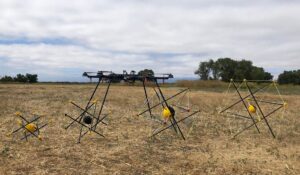 Aero Systems West Hexacopter Resting in a Field