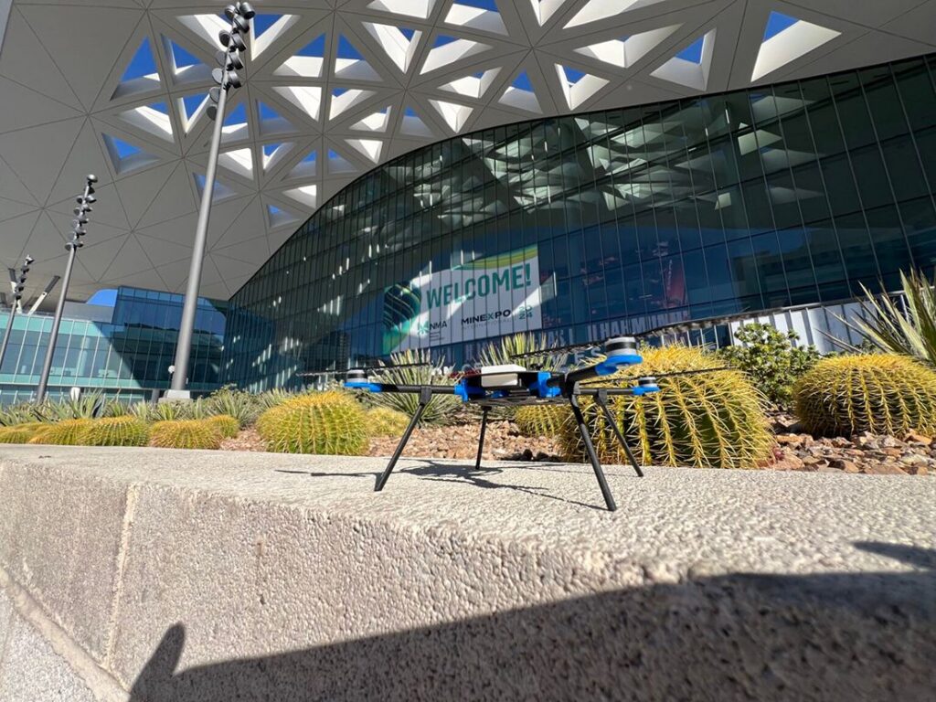 Minature Drone with CUAV 2024 MINEXPO in Background